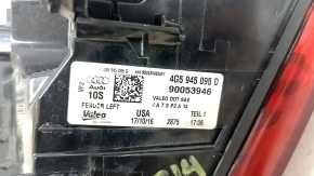 Left outer fender light for an Audi A6 C7 16-18, with scratches.