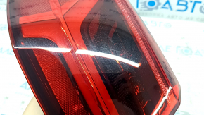 Left outer fender light for an Audi A6 C7 16-18, with scratches.