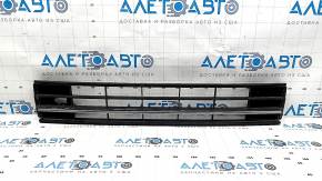 The central grille of the front bumper of the VW Passat b8 16-19 USA is missing an element, sand