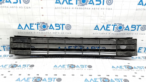 The central grille of the front bumper of the VW Passat b8 16-19 USA is missing an element, sand