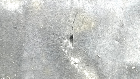 The engine guard of the Audi A6 C7 12-18 is worn and torn.