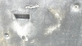 The engine guard of the Audi A6 C7 12-18 is worn and torn.