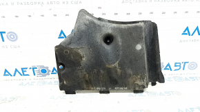 The front left underbody protection of the Audi A6 C7 12-18 is worn and dented.
