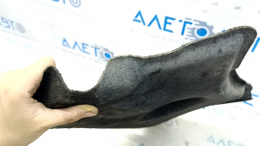 The front left underbody protection of the Audi A6 C7 12-18 is worn and dented.