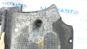 The front right underbody protection of the Audi A6 C7 12-18 is worn out.