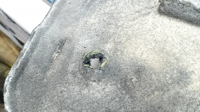 The engine guard of the Audi A6 C7 12-18 is worn and torn.