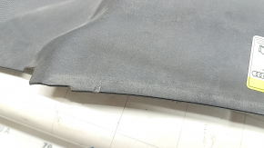The Audi A6 C7 16-18 TV trim panel has broken fasteners and scratches.
