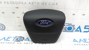 Black, scratched steering wheel airbag for the driver's side of a Ford Ecosport 18-22.