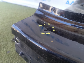 Left rear fender dent on an Audi A3 8V 15-20 4D, black, dents, and bumps