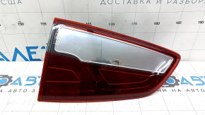 The left inner tailgate light for a Ford Ecosport 18-22 is dark, scratched, and the mount is broken.