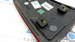 The left inner tailgate light for a Ford Ecosport 18-22 is dark, scratched, and the mount is broken.