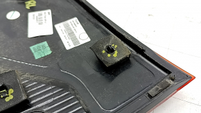The left inner tailgate light for a Ford Ecosport 18-22 is dark, scratched, and the mount is broken.