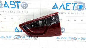 The right inner tailgate light for a Ford Ecosport 18-22 is dark and scratched.