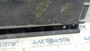 The right underbody protection of the Audi A6 C7 12-18 is worn and torn.