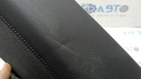 The side panel of the 2nd row of seats, left, Audi A6 C7 16-18, black leather, dented, scratches, needs cleaning