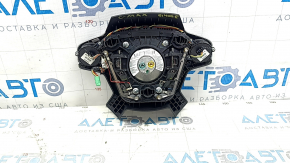 Black steering wheel airbag for Ford C-Max MK2 2013-2018, with buttons and scratches.