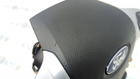 Black steering wheel airbag for Ford C-Max MK2 2013-2018, with buttons and scratches.