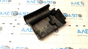 The fuse box cover under the hood of a VW Jetta 11-18 USA has a broken mount.