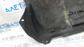 Ford C-max MK2 13-18 engine guard is torn, oiled, dented, and worn.