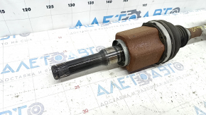 The front left half shaft of a Ford Ecosport 18-20 2.0 is rusty and has a torn boot.