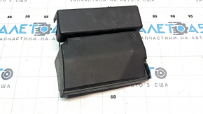 The underhood fuse box cover for a VW Passat B7 12-15 USA has a broken mount.