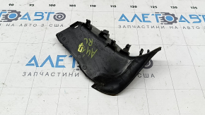 The left outer headlight cover for an Audi A4 B9 17-19 has a broken mount.