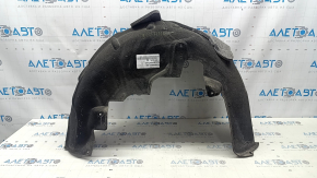 The rear right fender liner of a Mercedes GLC 16-22 has a torn fastener and tears in the fasteners.