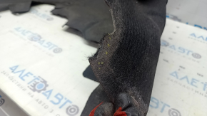 The rear right fender liner of a Mercedes GLC 16-22 has a torn fastener and tears in the fasteners.