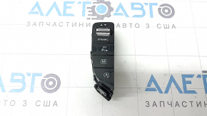 Control buttons on the left center console of a Mercedes GLC 20-22 with automatic parking, glossy black, scratches