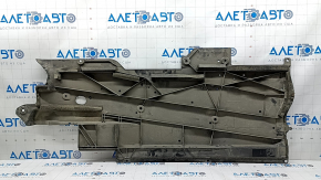 The left underbody protection of a Mazda 6 2014-2017 is cracked.