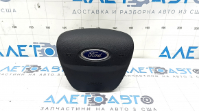 Black steering wheel airbag for the driver's side of a Ford Escape MK4 20-25, with a dented emblem.