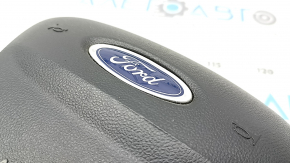 Black steering wheel airbag for the driver's side of a Ford Escape MK4 20-25, with a dented emblem.