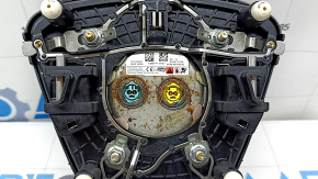Black steering wheel airbag for the driver's side of a Ford Escape MK4 20-25, with a dented emblem.