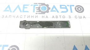 The ENERGI emblem on the front left door of a Ford Fusion mk5 13-20 is worn out.