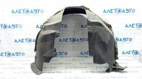 The front left fender liner of a Ford Fusion mk5 17-20 is torn.