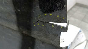 The front left fender liner of a Ford Fusion mk5 17-20 is torn.