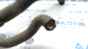 The lower cooling hose of the Lincoln MKZ 13-16 3.7 is torn.