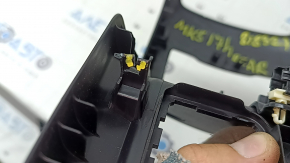 Rear center console trim for Ford Fusion mk5 17-20, black, under air vents, with backlight, under socket and cigarette lighter, scratches, cracks in fasteners