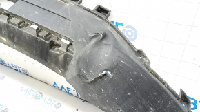 The front bumper lip of a Ford Escape MK4 20-22 without parking sensors is torn.