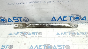 The left strut bar of a BMW 5 G30 17-23 2.0T, 3.0T, 530e hybrid is covered in soot.