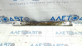 The left strut bar of a BMW 5 G30 17-23 2.0T, 3.0T, 530e hybrid is covered in soot.