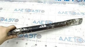 The left strut bar of a BMW 5 G30 17-23 2.0T, 3.0T, 530e hybrid is covered in soot.