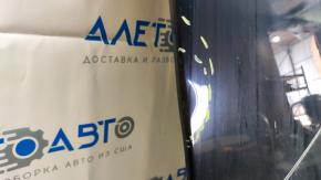 The panoramic roof glass of the Ford Mustang Mach-E 21-23 has a dented trim.