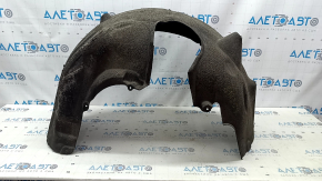 The rear right fender liner of a BMW 5 G30 17-23 has a torn fastener.