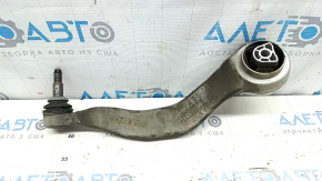 The lower front left control arm of a BMW 5 G30 17-23 RWD has a torn silent block.