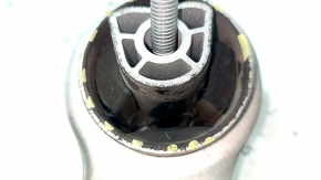 The lower front left control arm of a BMW 5 G30 17-23 RWD has a torn silent block.