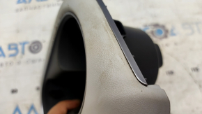 Hyundai Ioniq 5 22-24 center console cup holders with gray trim, worn