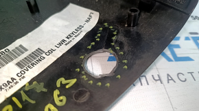 The steering column frame assembly for a Jeep Compass 17-18 is black, cracked, and the mounting is broken.