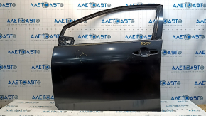 The front left door of a Toyota Prius 50 is bare, 19-22 dents.