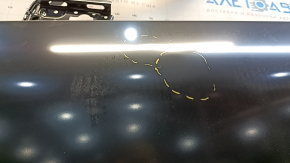 The front left door of a Toyota Prius 50 is bare, 19-22 dents.